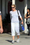 th_52497_Preppie_-_Christina_Applegate_walking_with_her_personal_trainer_in_L.A._-_Feb._17_2010_8102_122_75lo.jpg